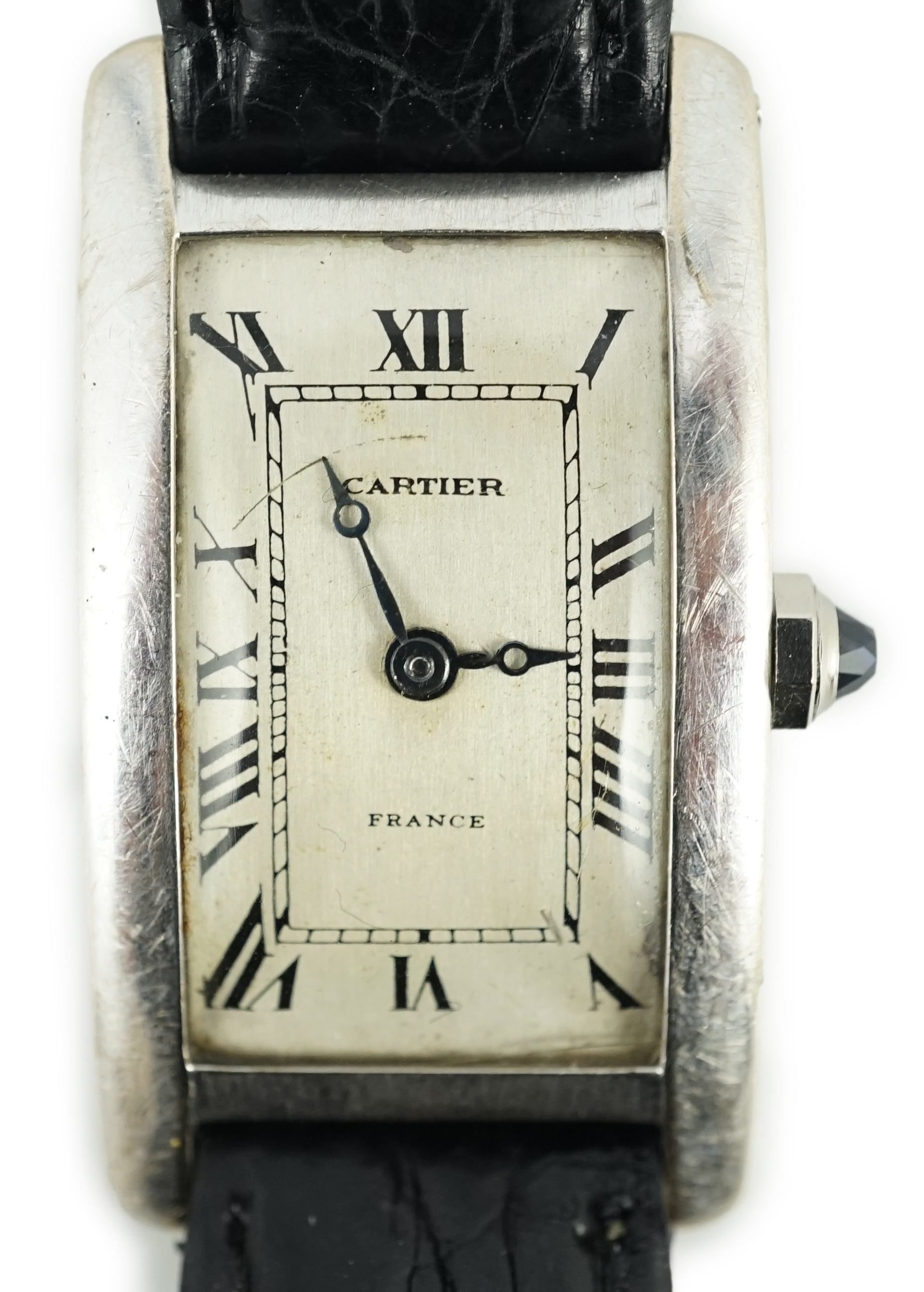 A 1920's 18ct white gold Cartier Tank Cintree (7 lignes model) manual wind wrist watch, with later 1970's movement and crown